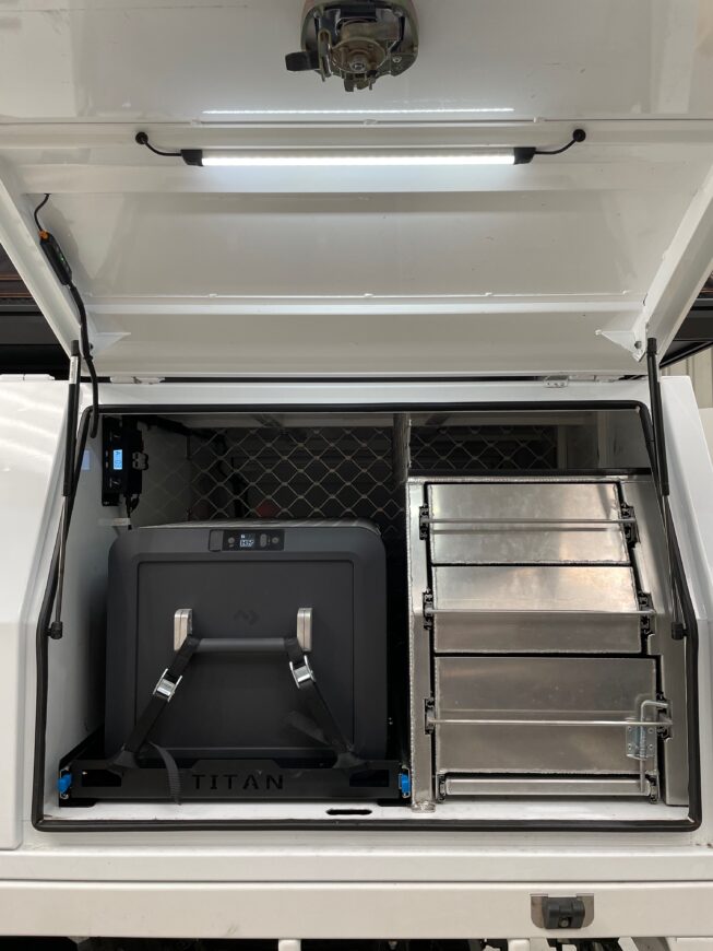 hilux canopy fit-out with 12v power, solar, lights and fridge